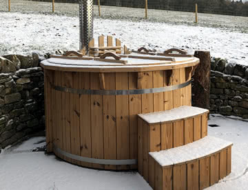 Log fuelled hot tub