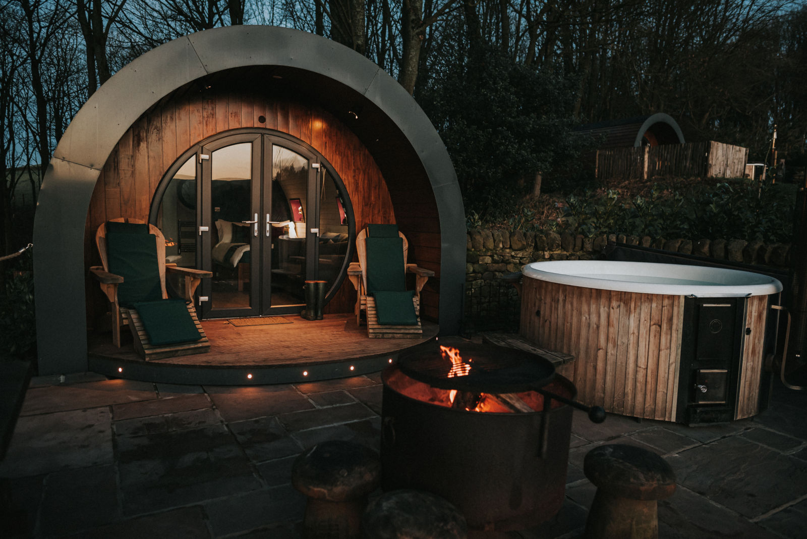 Luxury pod with hot tub, BBQ fire pit, and pizza oven at Catgill Farm.