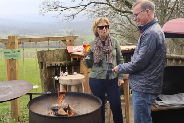Couple in the Ski Station Alpine Pod at Catgill Farm.